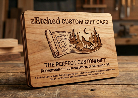 Wooden gift card with zEtched Custom Gift Card branding on a wooden surface.